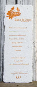 Letterpress printed wedding invitation with birds on handmade seed paper